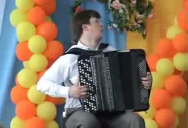 Many people can play the accordion, but this boy is a genius