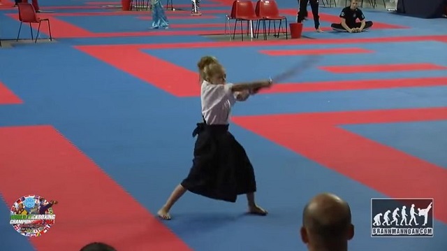 The energy of this little girl amazes a whole audience. Watch how she handles her sword!