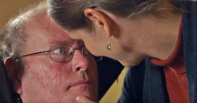 He hasn’t talked for almost a year, but watch what happens when he looks into his wife's eyes