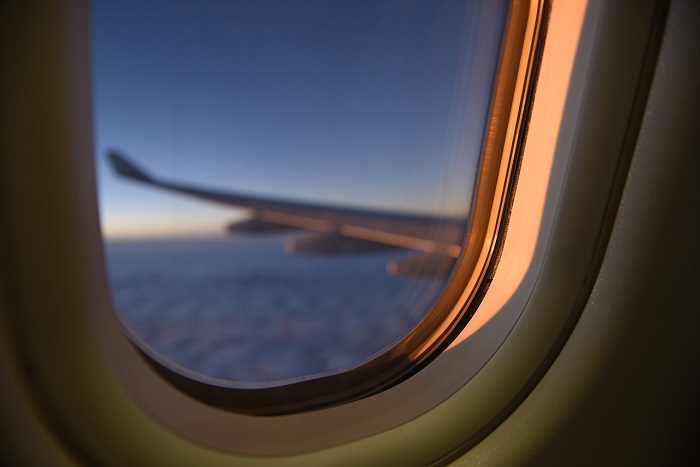 Why are the windows of airplanes always of a rounded shape?