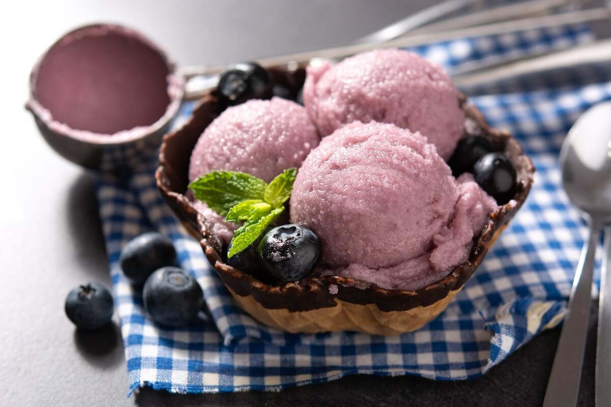 Sugar-free fruit ice cream with cream and strawberries